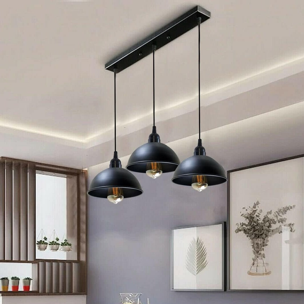 Black 3 light Pendant Light  over a kitchen & bar~5268-0